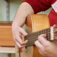 Musiktherapie mit Gitarre